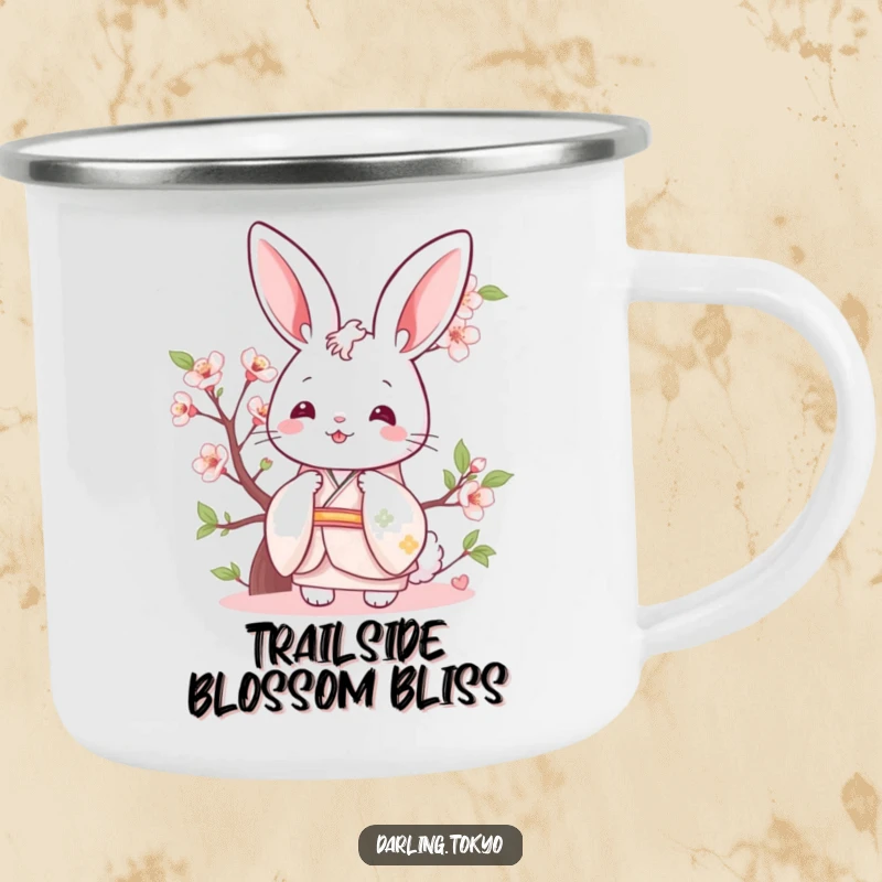 Funny bunny in a pastel kimono peeking from behind a cherry blossom on a camping mug.