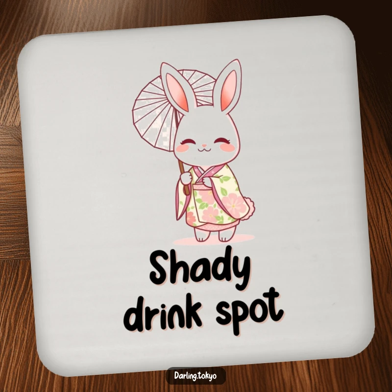 Funny coaster featuring a cheerful rabbit character in a floral kimono, holding a delicate parasol to protect surfaces.