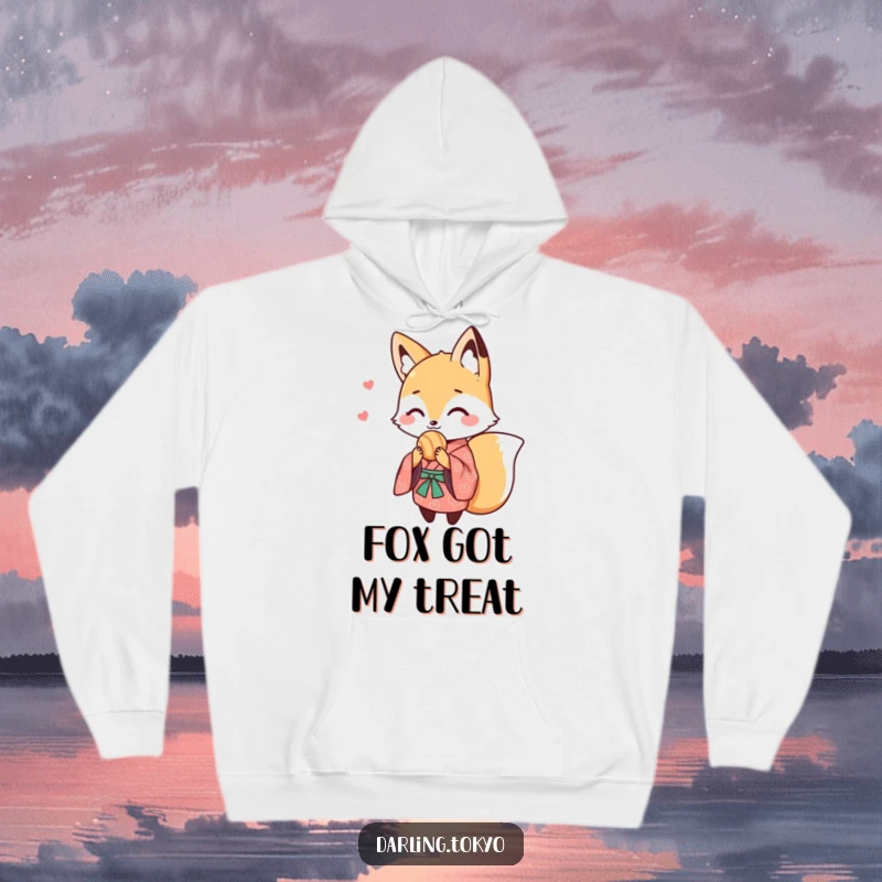 Funny hoodie showcasing a cute fox in a patterned kimono, sharing a sweet treat, offering warmth and delightful, humorous charm.