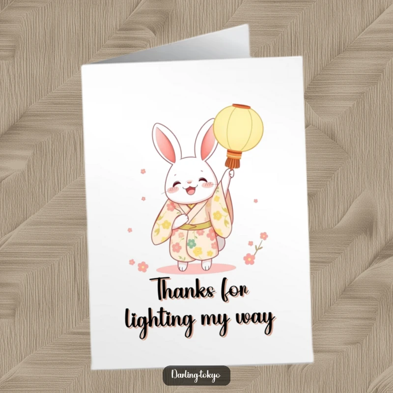 Funny Free Printable Rabbit Thank You Card, a character in a floral kimono joyfully holding up a paper lantern, conveying thanks with whimsical charm.