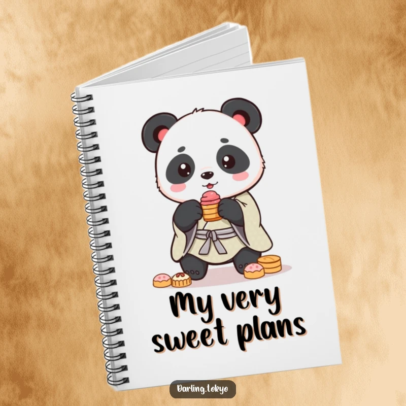 Funny panda in a kimono balances a stack of treats on the cover of this delightful and funny notebook.