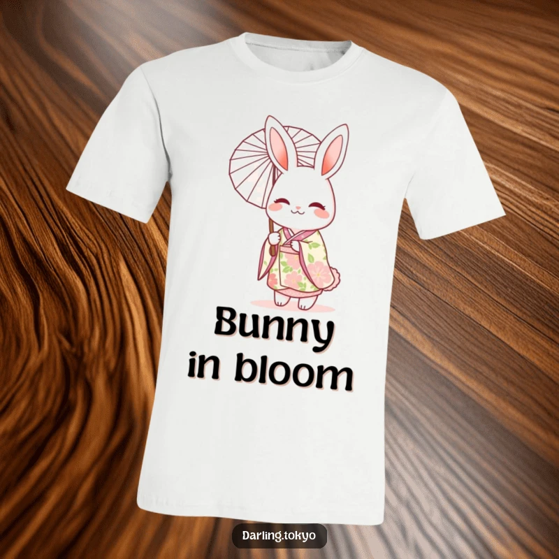 Funny T-shirt depicting a cheerful rabbit character in an elegant floral kimono, holding a delicate parasol with grace.